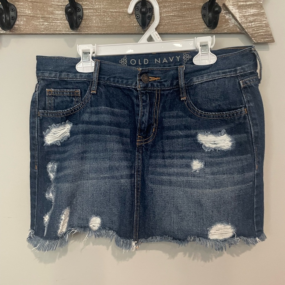 Old Navy mini Denim skirt. Dark washed distressed denim.